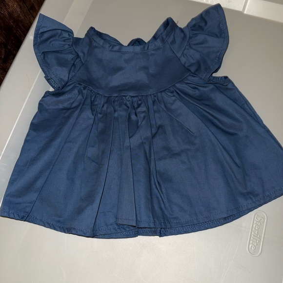 Boutique- Navy Blue Ruffled Top and Floral Bloomers Set - Picture 2 of 5